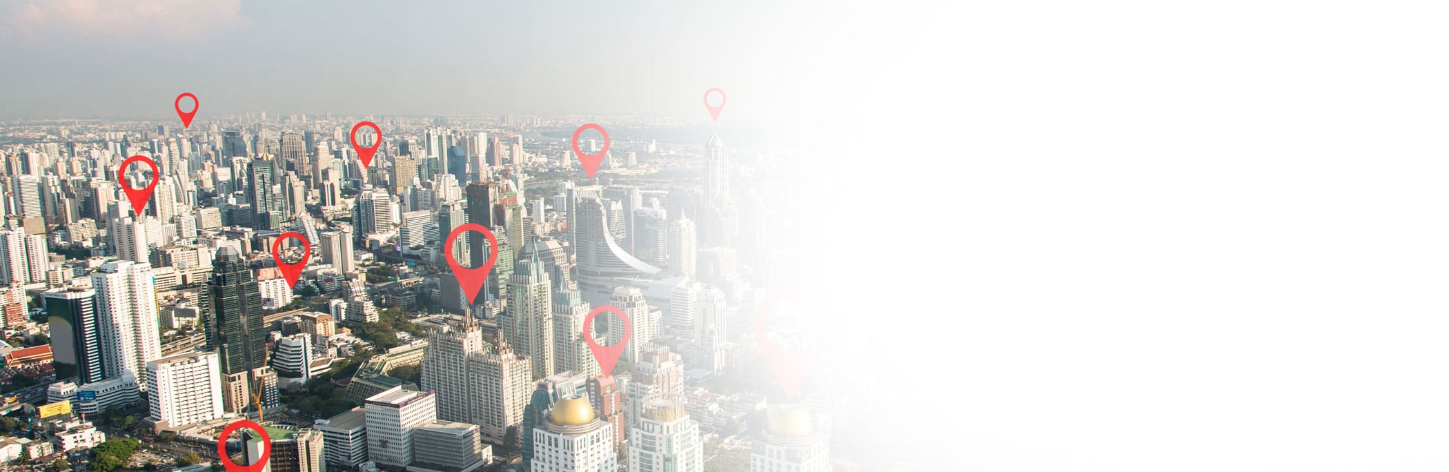 Searching location on map and pin above blue tone city scape